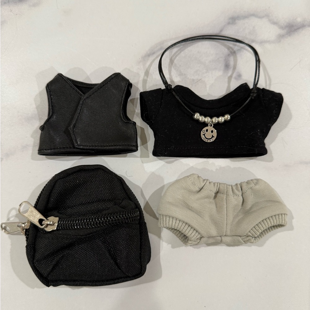 Labubu 5 piece outfit.Tee, leather vest, pants, backpack, leather smile necklace